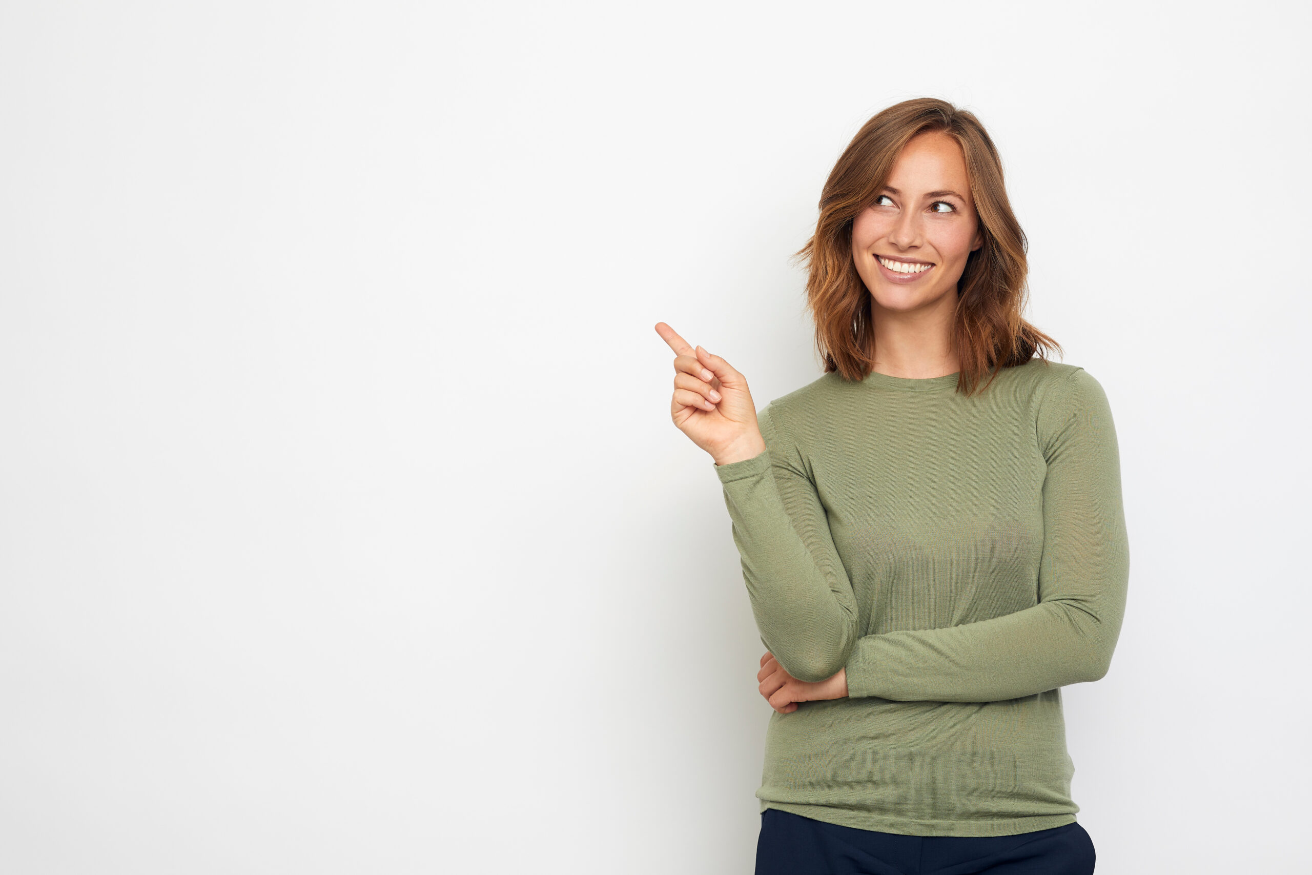 A person smiling and gesturing, thinking clearly